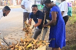 Some members of NHIS office in Obuasi engaged in a clean-up exercise