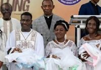 The couple and some ministers of the church