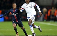 Baba Rahman in action against PSG