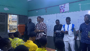 Alfred Kotey Ashie encouraging some of the BECE students