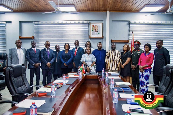 A photograph of the new board members of NSA with the minister