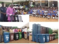 Mr. Adjei Sowah addressing some students during a presentation of 268 waste bins to basic schools
