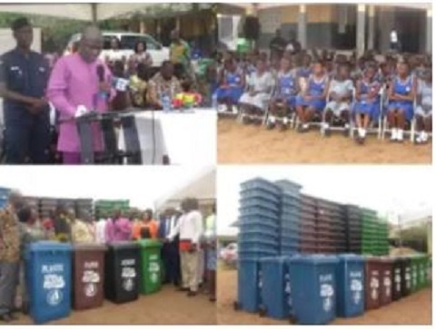 Mr. Adjei Sowah addressing some students during a presentation of 268 waste bins to basic schools