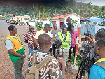 Dafeamekpor (in cap) speaking with the media during the inspection