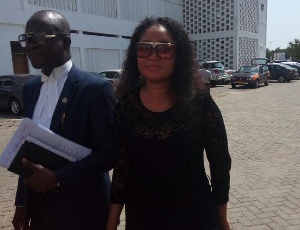 Suspect Queenie Akuffo  with her lawyer