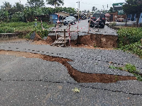 An image of the dilapidated bridge showing visible cracks