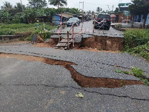 An image of the dilapidated bridge showing visible cracks
