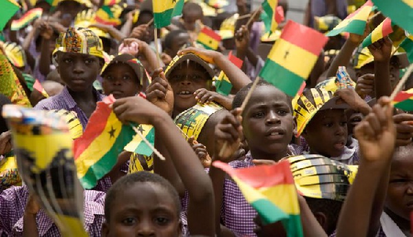 Pupils from selected schools stood by the road to wave at the two presidents on Monday