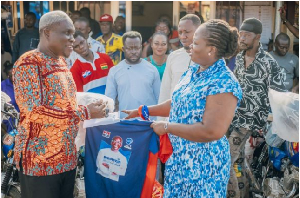 A senior member of the NPP, Amma Frimpomaa, (R) making a presentation