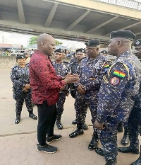 Haruna Iddrisu in talks with some police personnel