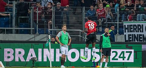 Köhn in number 18 shirt celebrates a goal