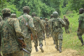 Uganda People's Defence Forces (UPDF) troops are seen on the Mbau-Kamango road
