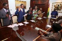 President Akufo-Addo swearing in board members of the Ghana International Trade Commission