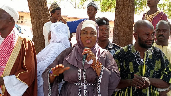 Mary Tasha speaking to the Muslim gathering