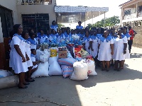 Members of the GA East District One Ladies Auxiliary with their donations