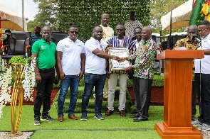 Alex Kofi Annin General manager of Newmont Africa Ahafo Mine receiving a citation