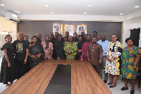 A picture of Yaw Sarpong's family and members of the tourism ministry