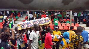 Some NDC supporters were seen carrying coffin with pictures of Akufo-Addo at the manifesto launch