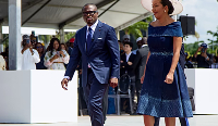 Benin's President-elect Romuald Wadagni (L) and First Lady  arrive for the inauguration