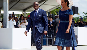 Benin's President-elect Romuald Wadagni (L) and First Lady  arrive for the inauguration