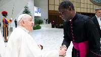 Pope Francis (L) with Monsignor Julien Kaboré, the new Apostolic Nuncio to Ghana