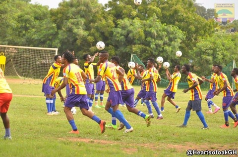 Hearts of Oak team members warming up before a game