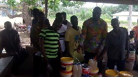 MCE for Nzema East, Frank Okpenyen handing over the items to the staff of the school
