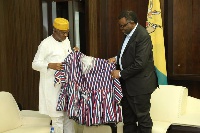 Ambassador Abdul-Rahman Haruna Attah presenting a parting gift
