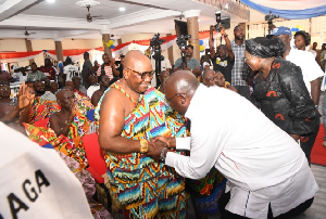 Chief of Atasomanso, Nana Owusu Barimah III and Dr. Bawumia in a handshake