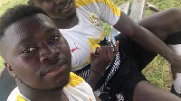 Peter Danso-Mensah  with a member of the Black Meteors at the training ground