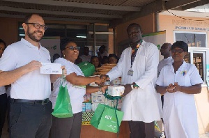 Advans Ghana Savings and Loans donating the items to the La General Hospital