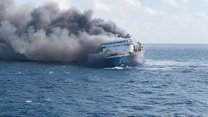 KMP Mutiara Sentosa 2 ferry with thick plumes of smoke billowing from behind