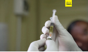 A pharmacist holds lenacapavir, an HIV-prevention drug