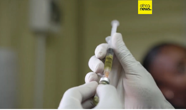 A pharmacist holds lenacapavir, an HIV-prevention drug