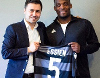 Essien being presented with a Sabail jersey