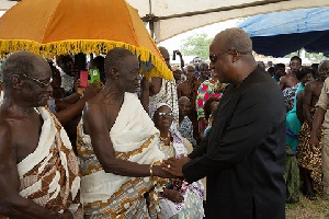 Mahama shakes hand with Acting Kwahu Chief upon inspecting the Kwaku Water Project at Kotoso