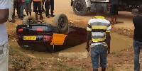 The taxi skidded off the road and landed in a gutter