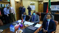 Sudan's Minister of Irrigation and Water Resources Yasir Mohamed (centre) in a video meeting