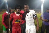 Asante Kotoko's Sogne Yacouba and Asamoah Gyan after the match