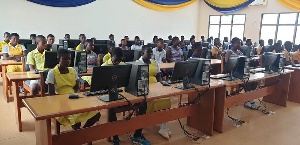Some beneficiaries of the facility try out the computers