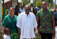 President John Dramani Mahama (in white smock) with the Asafa Powell family