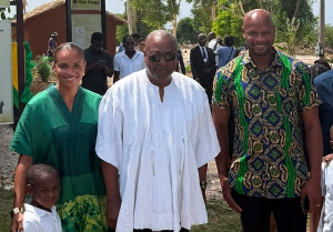 President John Dramani Mahama (in white smock) with the Asafa Powell family