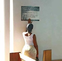 The Curvy lady displaying her backside in church