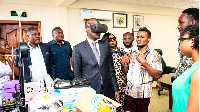 A photo of Haruna Iddrisu testing the Adwenpa Project new tech