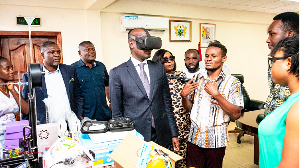 A photo of Haruna Iddrisu testing the Adwenpa Project new tech