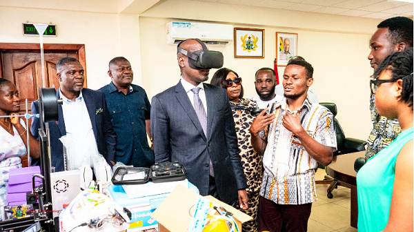 A photo of Haruna Iddrisu testing the Adwenpa Project new tech