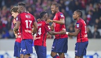 Yaw Yeboah, middle celebrating a goal with Lille team-mate, is at Lille on loan from Man City
