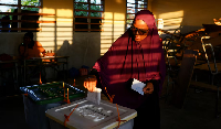 A local votes during the general elections at Inhambane, in southern Mozambique