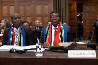 Vusimuzi Madonsela, South Africa's justice minister, attend the first hearing of genocide case