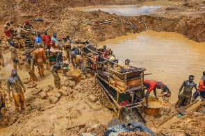 Workers at a mining concession